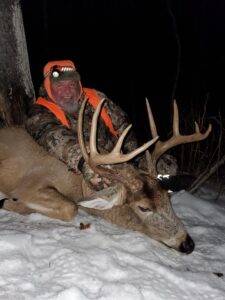 A successful Whitetail hunters with Saskatchewan Big Buck Adventures